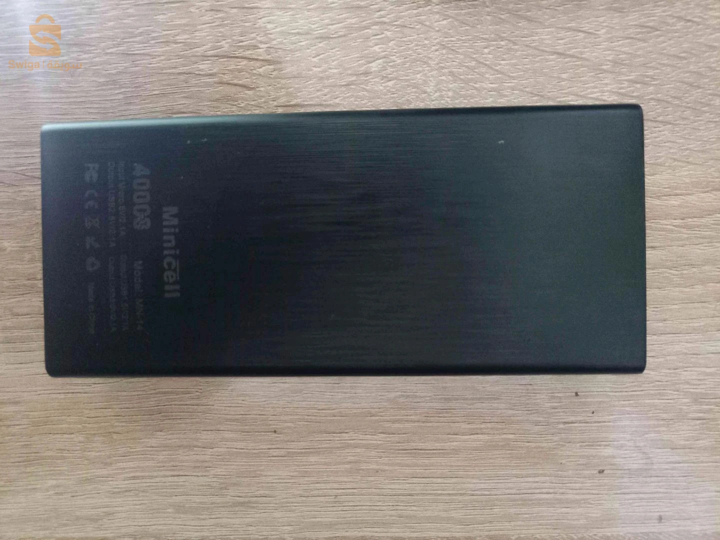 "باور بنك Minicell MN-14 العملاق 40,000mAh - طاقة تدوم لأيام، 3 منافذ شحن، وكشاف LED قوي!"