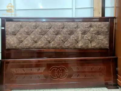 Red wooden bed