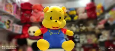 ours en peluche jaune pooh