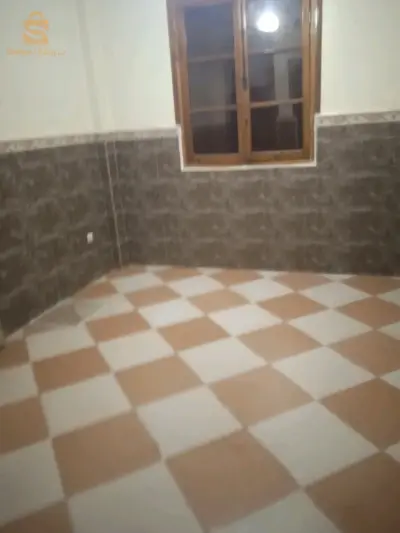 حي 200مسكن تساهمي سيدي عيسى
