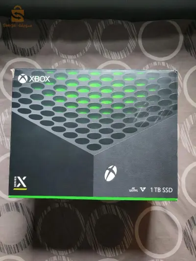 Xbox serie X avec 2 batterie et sont support plus CD jeu