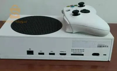 xbox series s avec ça boîte et une manette elle est neuf