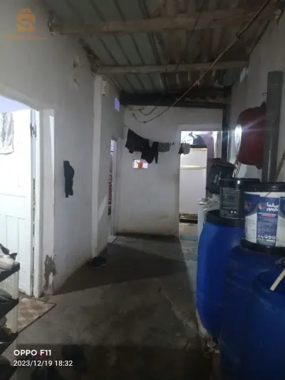 منزل في طريق التسوية
