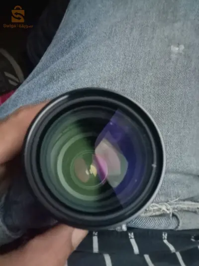 Objectif Caméra ZOOM Nikkor 35~135mm , avec sa pochette originale ..