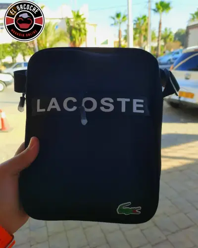 ساكوشة lacost بلونين الاسود  والازرق 🐊✨
نوعية جد ممتازة 💯
+ التوصيل متوفر ل58 ولاية 😎