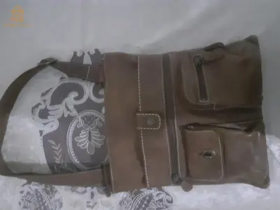 genuine ROOTS LEATHER