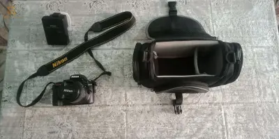 كامرا jvc  pro +كامرا ابراي فوتو Nikon مع اكسسواراتهما