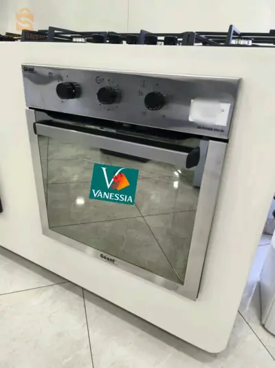 Four encastrable géant miroir inox