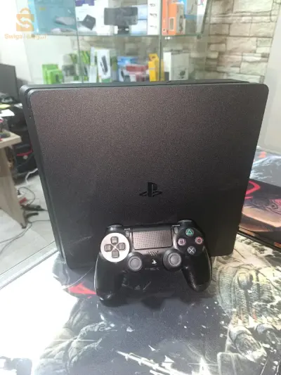 PS4 slim 1 TB + jeux assassins Creed