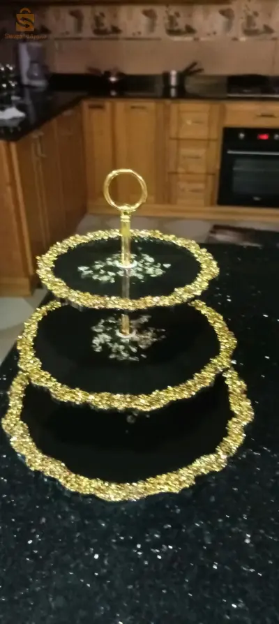 ساعات نوعية رفيعة حسب الاختيار وحامل حلويات