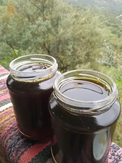 عسل حر أسود طبيعي