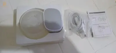 tire lait automatique neuf