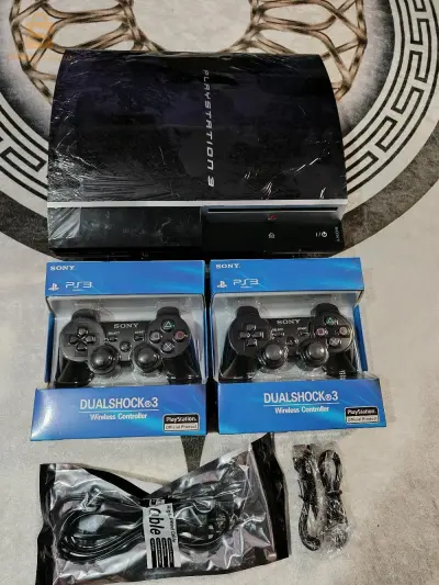 ps3 160gb flaché avec 2 manett