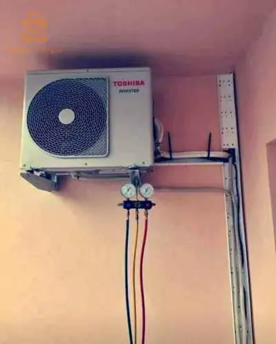 صيانة وتعبأت غاز