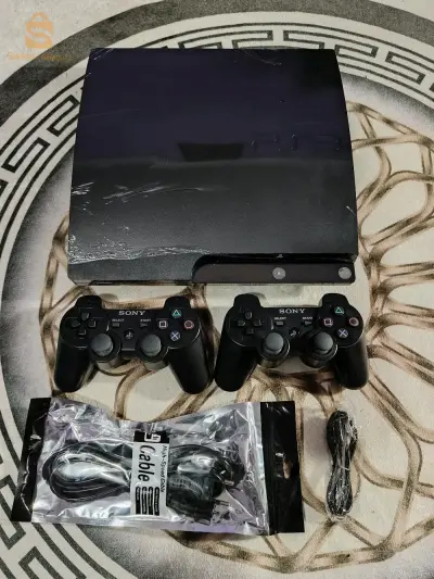 ps3 slim 320gb flaché avec 2 manett