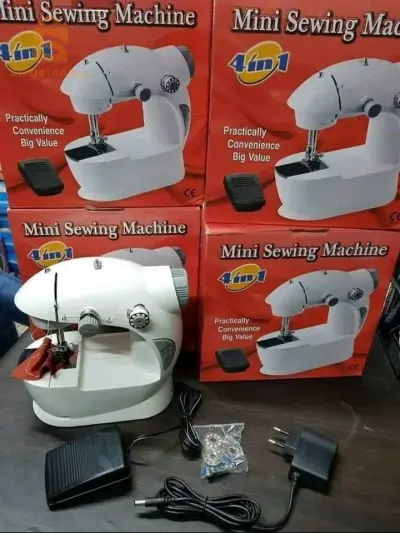 ماكنة الخياطة المتنقلة Mini Sewing Machine