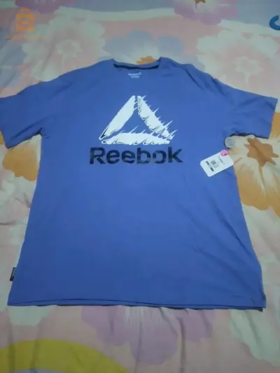 T-shirt la Marque Reebok.taille M.haja chaba habat caba.