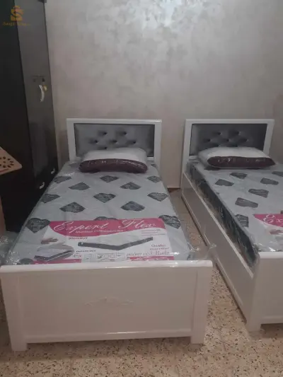 غرف نوم للاطفال خشب احمر من الورشة