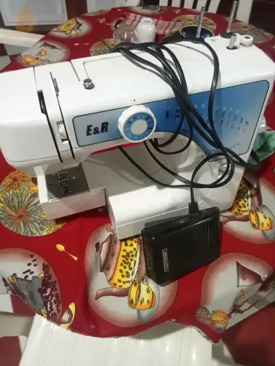 آلة خياطة هابطة كابة