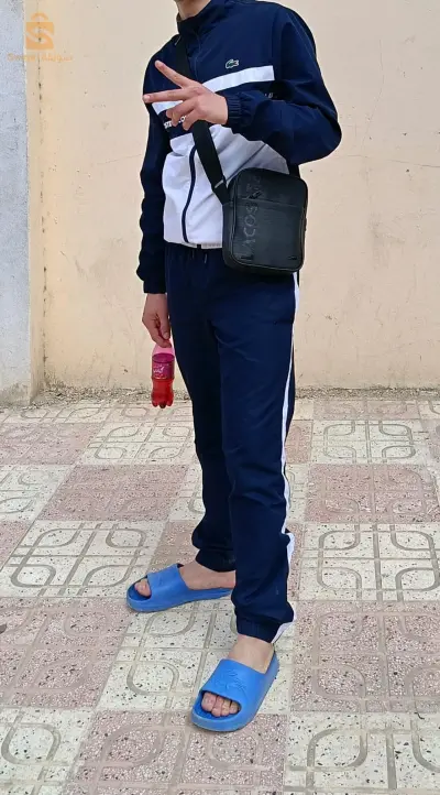 ملابس رياضية لاكوست