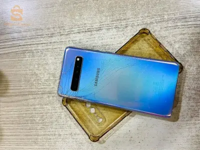 téléphone n9i fih fissuré arrière apar sa kolech règle