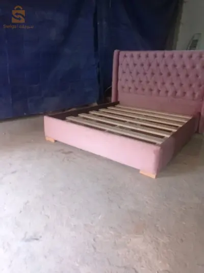 lit capitonné bois de rose