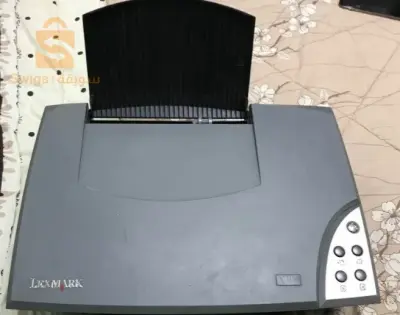 طابعة lexmark دير فوطوكوبي،  تطبع بيها،  تسكاني، تخدم بالالوان و noire et blanc للبيع