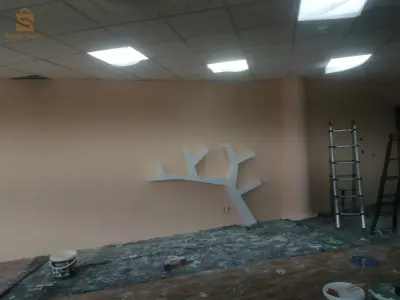 تهيئة و طلاء و تركيب جميع أنواع الجدران و الأسقف