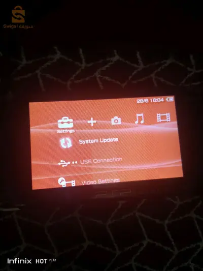 psp1000+شرجار دورجين بحالة جديد