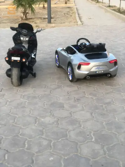 سيارة اطفال كهربائية مستعملة و درجة كهربائية للاطفال