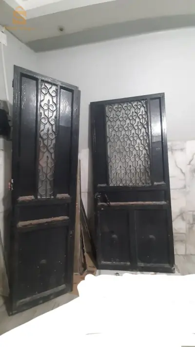 Vends porte métallique en 2 volets