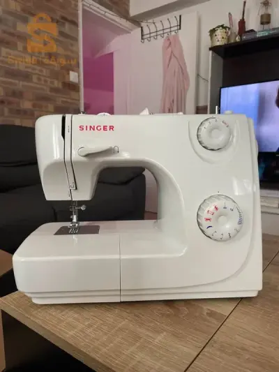 machine à coudre singer 8280 
livraison gratuite/24mois