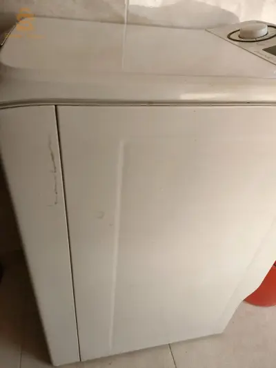 Machine à laver en panne (