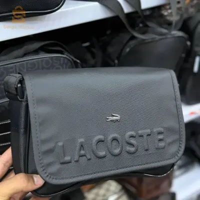 sacoche Lacoste noir l'évasion 58 wilayas🇩🇿