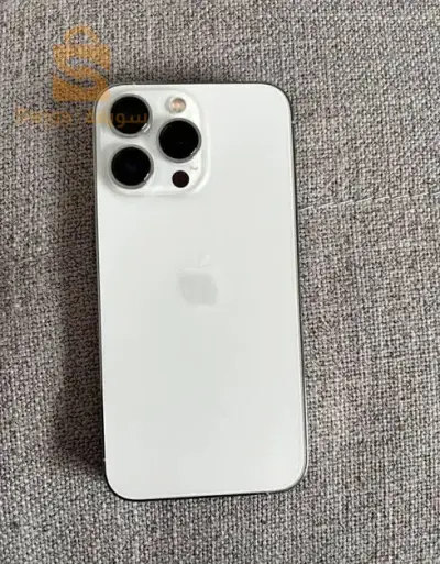 Kayn iphone 14 pro  Couleur blan jdid eta 10
Haja mm3wda fih
Batrie 91%🔋
Stokage 256 GB