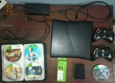 Xbox 360 slim en bon état originale