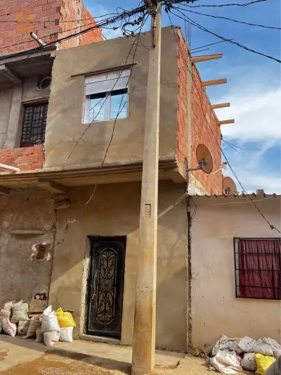 حوش في إطار التسوية حي بوعمامة كوكاً وهران