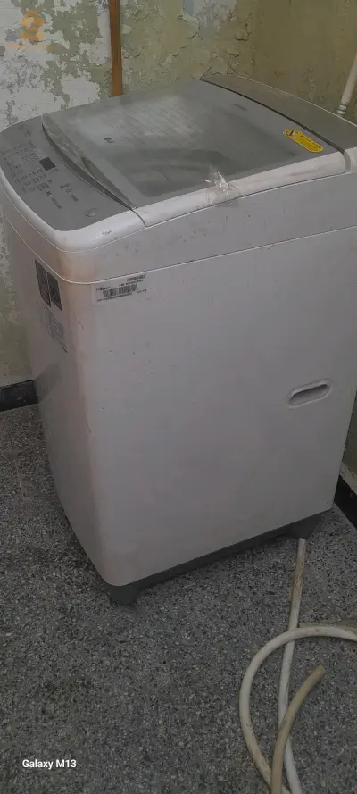 machine a laver lg 13kg la top mâche très bien avec garantie. 0558098079