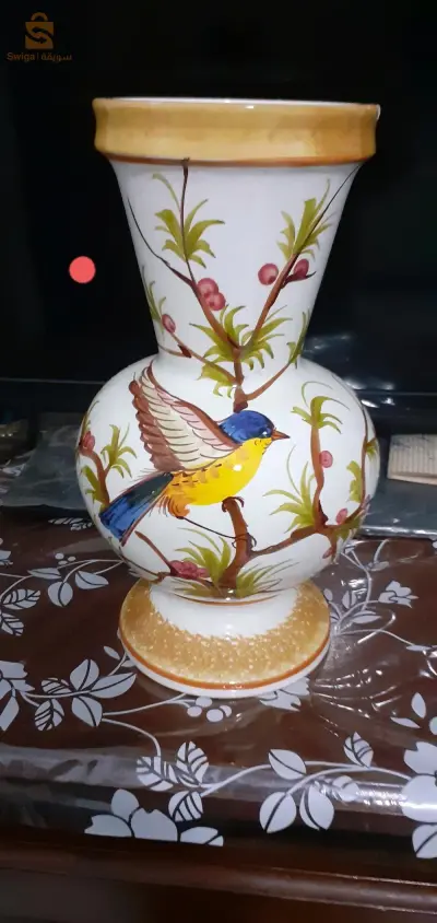 trés jolie vase à fleurs