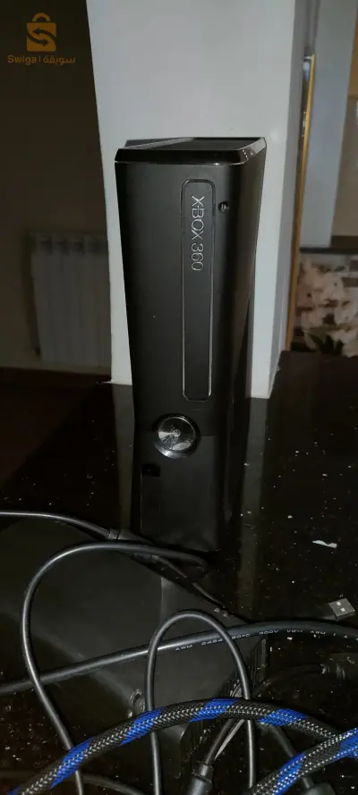 اكس بوكس360 ... مستعمل...فيها 24 لعبة...الستوك 250gb
