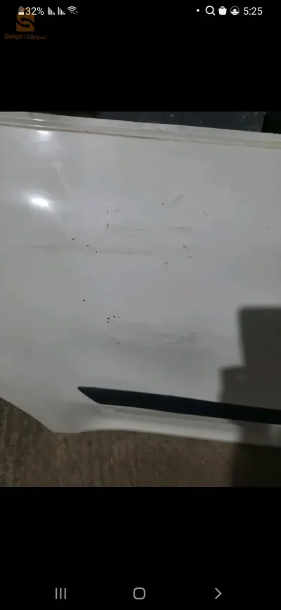 باب ايمن خلفي  sckoda yeti لون ابيض فيه افروا