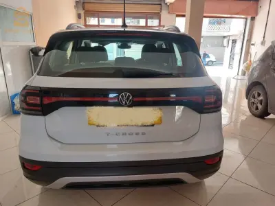T CROSS