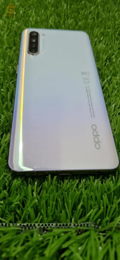 oppo find x2 lite + écouteurs sans fil qilive 
livraison disponible