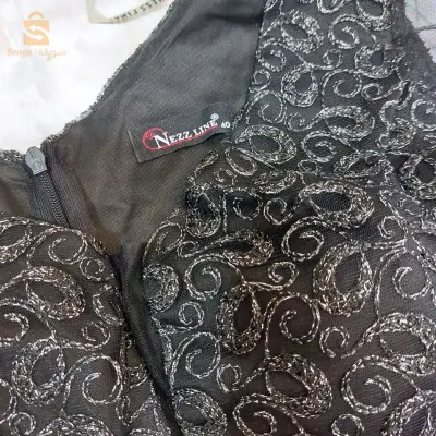 فستان سهرة اسود وفضي