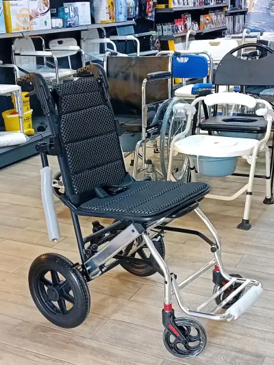 CHAISE DE TRANSFERT كرسي متحرك قابل للطي