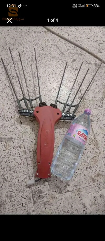 الة جني الزيتون