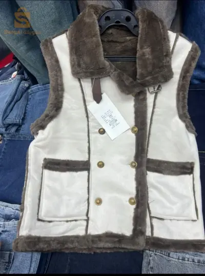 veste décolleté en fourrure femme