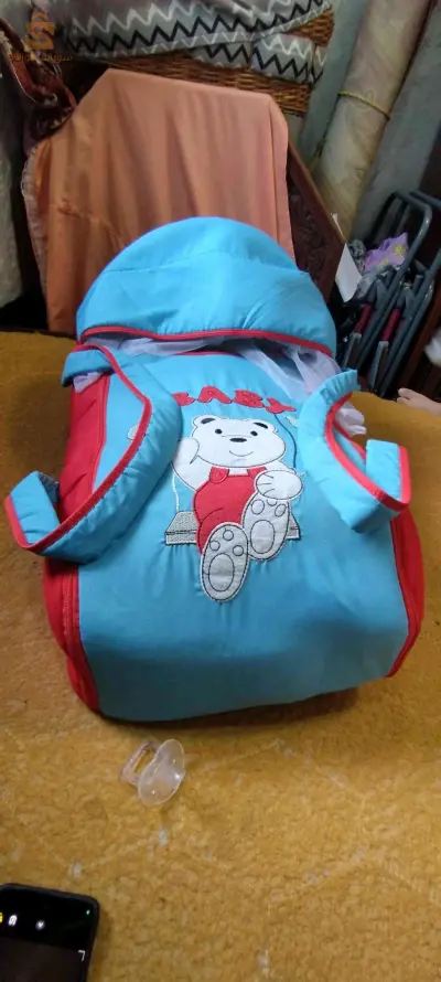 coufi et porte bébé