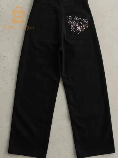 black jeans and long sleeve shirt