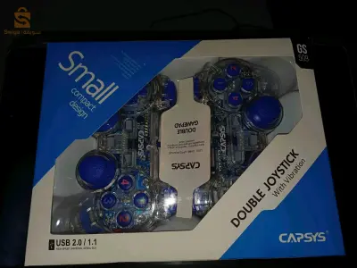 Two computer controllers with blue light